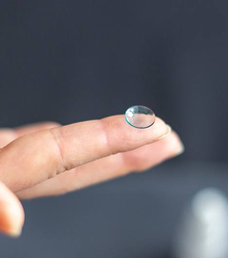 Hand holding lens for Ortho-K in Richmond