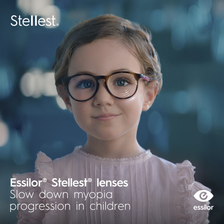 A young girl with glasses, showcasing the words "Essilor - Stellest - lenses," related to dentistry