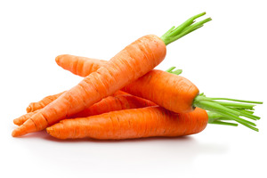 Four carrots representing vitamin A foods for eye health